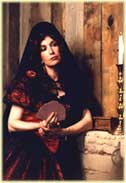 Woman in traditional attire holding a stringed instrument by a wooden wall.